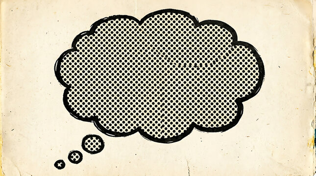 A comic-style thought bubble floats above a worn surface in a creative workspace with a rounded outline.