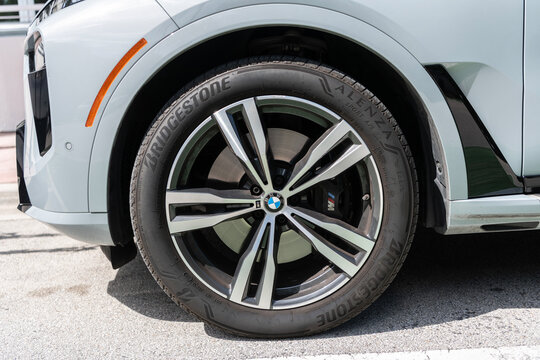 Miami, Florida, USA - July 27, 2025: BMW X7 luxury Sport Activity Vehicle SAV or SUV 2023 car. Luxury SUV or SAV car BMW X7. Car BMW X7 parked outdoor. Grey car, wheel tire.