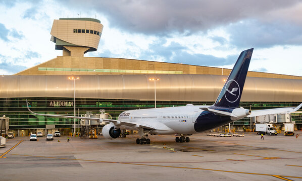 Miami, Florida, USA - October 30, 2025: Plane arrival of Lufthansa airline. Arrival at airport terminal. Airplane terminal. Airport terminal with Airbus A350. Airbus A350, Lufthansa airline