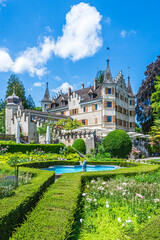 Views of Schloss Seeburg castle at Lake Constance in Kreuzlingen with gardens and clear blue sky during daytime in canton Thurgau, Switzerland © Daniela Baumann