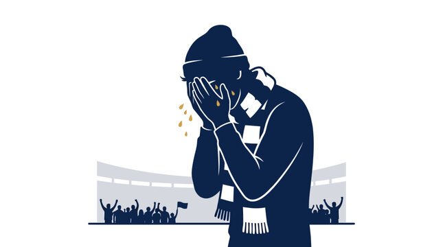 Supporter wearing a scarf expresses deep sorrow and emotional defeat after a difficult loss in a crowded stadium.