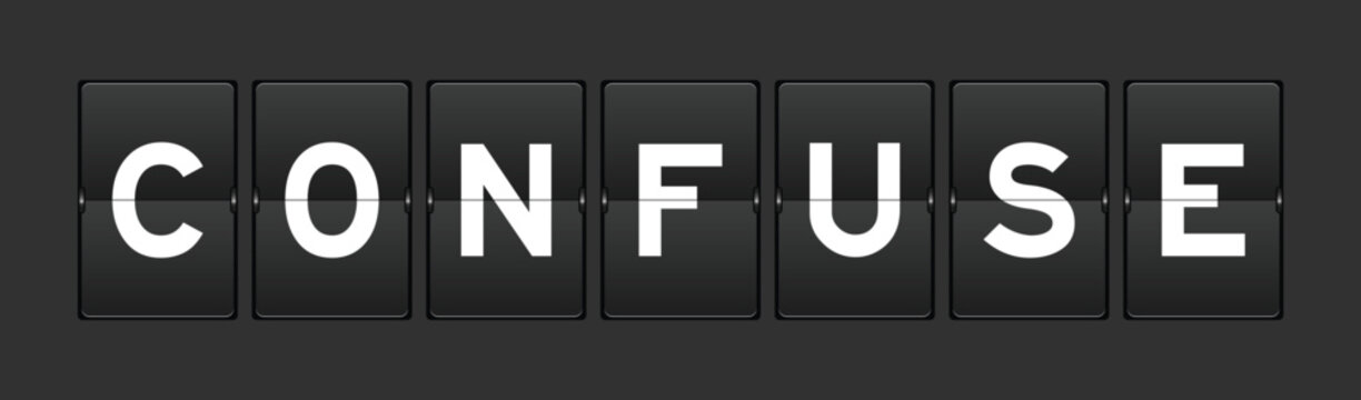 Black color analog flip board with word confuse on gray background