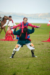 Fototapeta premium Mongolian traditional dance performed at the Naadam Festival
