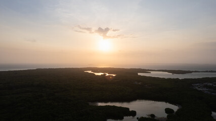Baru coastline sunset view over tropical forest and caribbean sea © Hector Pertuz