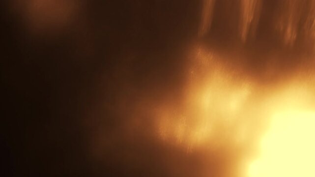 Warm cinematic golden light leak lens flare bokeh transition overlay