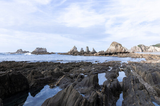 Gueir&uacute;a beach rocky coastline with flysch formations and atlantic waves