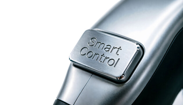 Macro focus on a tactile "Smart Control" button on an EV charging plug unit, sleek metallic texture, white background