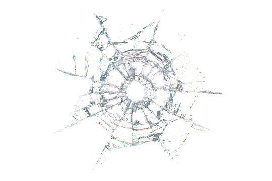 Circular shattered glass impact isolated on transparent background. Broken glass hole effect with radial cracks and fragmented pieces, useful as overlay or damage texture.