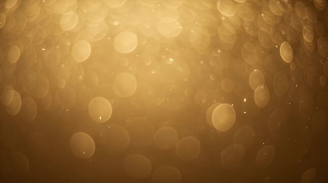 Abstract golden bokeh lights creating a warm and dreamy atmosphere.