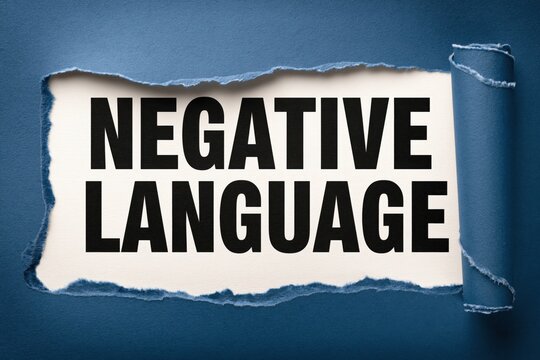 Negative language text written under torn horizontal blue paper