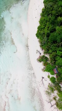 Aerial top view of Camiguin volcano island with white sand turquoise water Philippines