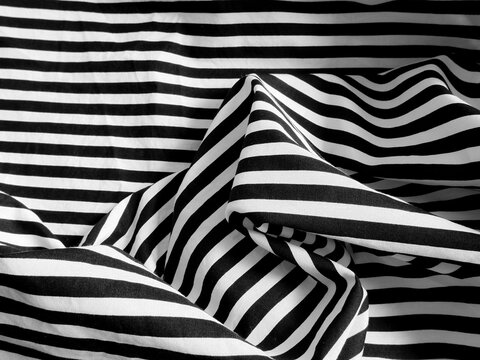 Black and white striped fabric background