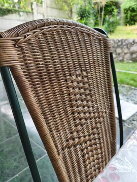 Close up texture of woven rattan chair backrest outdoor