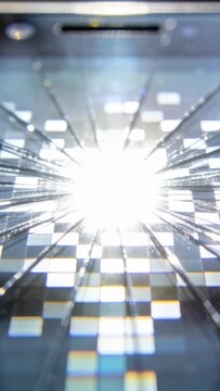 Vertical video: Flashing light hitting cracked phone glass revealing radial cracks pixel grid macro
