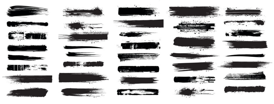 Set of black grunge brush strokes isolated on white