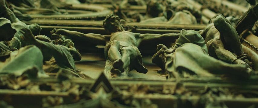 Detailed relief sculpture of crucifixion at Duomo di Milano in Italy