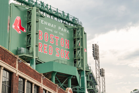 Boston, MA, US-April 8, 2026: The green monster wall at Fenway Park in the Kenmore Square neighborhood reading Boston Red Sox.