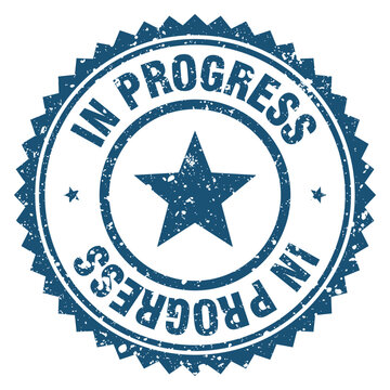 in progress blue grunge round stamp. in progress stamp