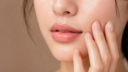 Obraz premium Beauty portrait of a woman with radiant skin and soft lips