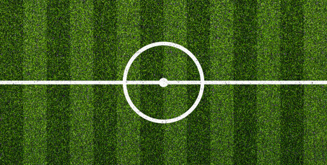 Artificial soccer turf with white center line and circle marking on green grass texture. Sports background for soccer field, training ground, stadium, and game design. © natrot