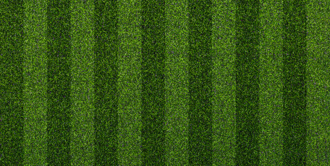 Artificial soccer turf texture with dark and light green striped pattern. Sports background for soccer field, training ground, stadium, and outdoor design. © natrot