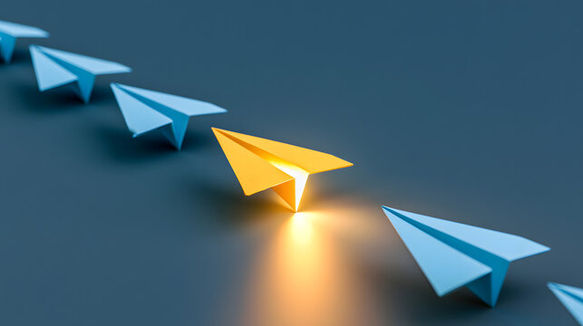 A distinctive business strategy concept using bright yellow paper airplanes, which pivot from the backdrop of blue planes &ndash; symbolizing innovation and a unique vision