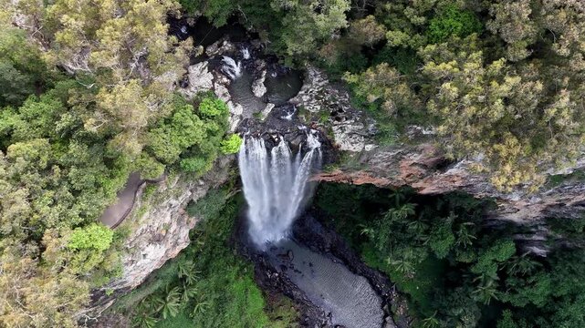 Aerial View of Purling Brook Falls Cascading into a Lush Rainforest Canyon, Springbrook National Park Gold Coast Australia