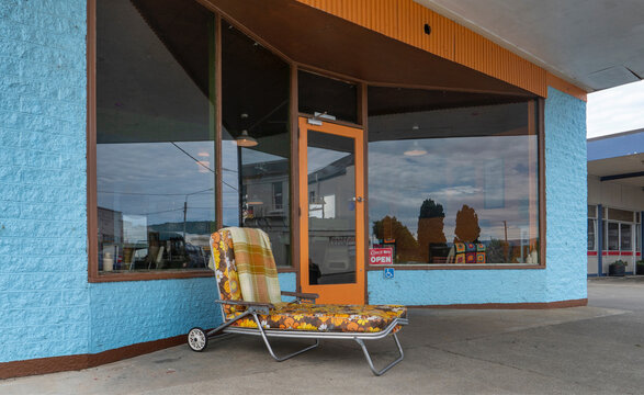 Vintage style shop with sunbed in front at Riverton New Zealand. Village in rural South Island