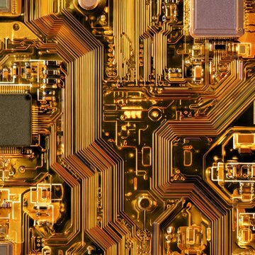 Golden electronic circuit board macro shot
