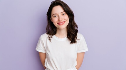 Obraz premium Young western woman wearing a white tshirt and light shorts in a relaxed summer casual style that represents comfortable warm weather fashion popular in Europe and America.