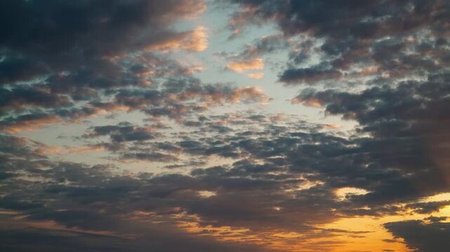 Celestial timelapse of cloudy sky at sunset. The natural movement of clouds in the sky and the unique beauty.