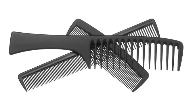 Group new plastic black hair comb flying, isolated on white background, clipping path 