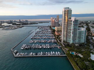 Fototapeta premium Marina Bay filled with vessels and yacht in Miami. Skyline with yachts in Miami.