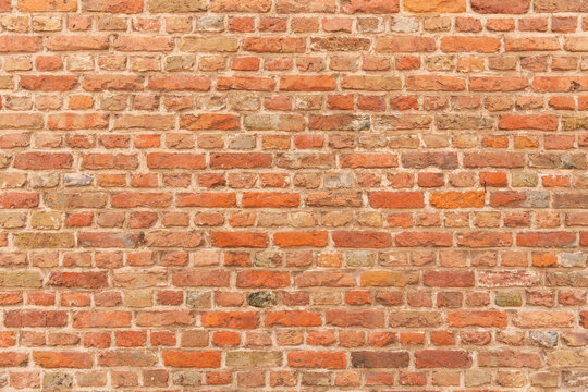 Middelburg, Netherlands. Full frame brick wall texture background with natural color variation and masonry pattern