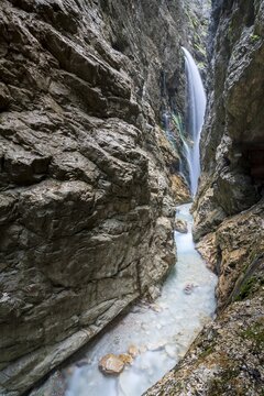 Waterfall and Hammersbach mountain stream in the H&ouml;llentalklamm, H&ouml;llental, near Grainau, Garmisch-Partenkirchen, Bavaria, Germany
