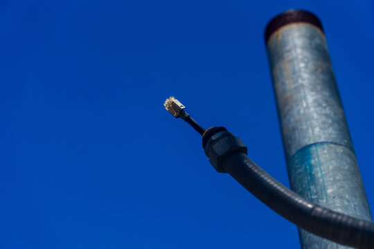Industrial Chimney and Pipe Under Blue Sky