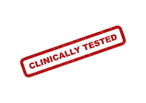 Red rubber stamp impression with the text clinically tested on paper