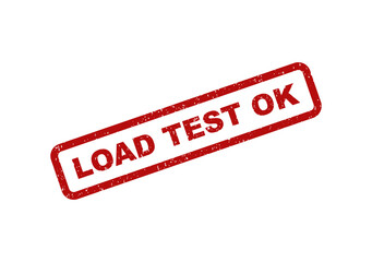 Red rubber stamp impression with the text load test ok on paper © Print Prodigy