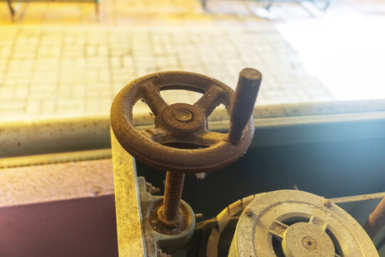 Rustic Wheel and Gear Mechanism in Vintage Setting
