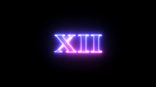 Multi colored inscription roman numerals XII with light colored spots floating inside looped alpha channel at the end. 4K footage download