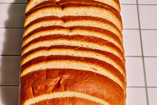 Sliced Artisan Bread In Warm Natural Sunlight
