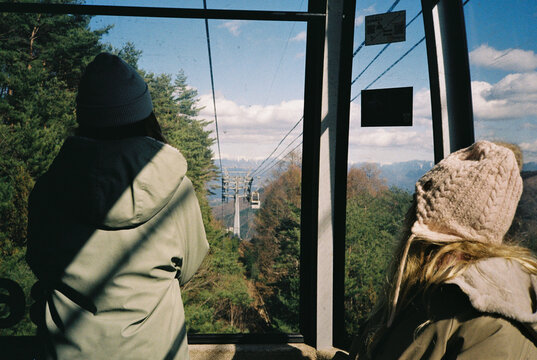 Children in a Gondola lift in Japanese mountains
