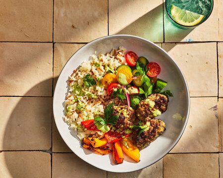 Healthy Grain Bowl With Vegetables in Warm Sunlight