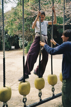 Girl with father on a playground
