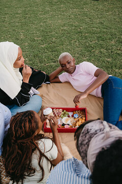 Friends in a park at a picnic