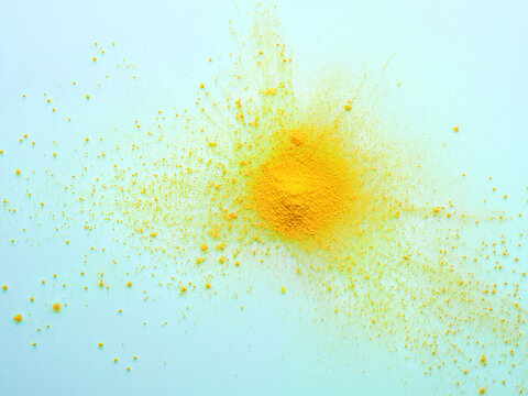 Yellow powder on a light blue background 