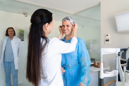 Medical Staff Preparing a Patient for a Procedure at a Clinic