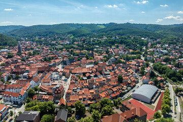 Drone aerial view of the historic old town of Wernigerode with Wernigerode Castle overlooking the city in the Harz Mountains region of Saxony-Anhalt, Germany © Raiko Goldenbaum
