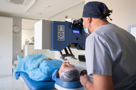 Medical Professional Uses Advanced Laser Equipment