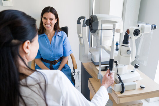 Doctor Talks to Patient During Eye Exam